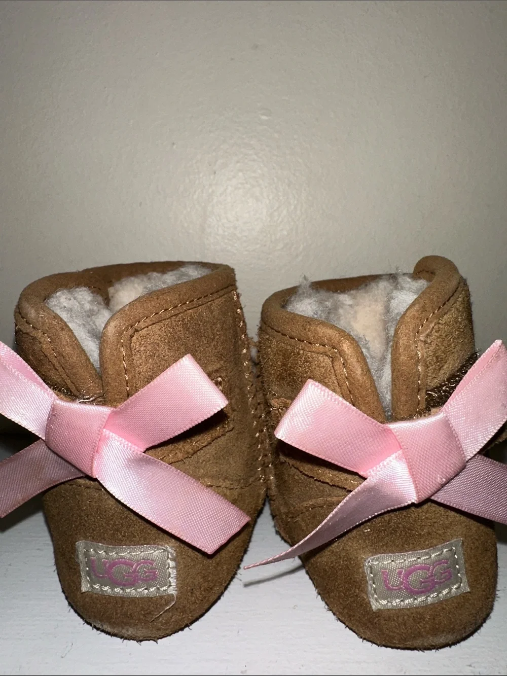 UGG Baby Shearling Booties with Pink Ribbon - Chestnut Brown